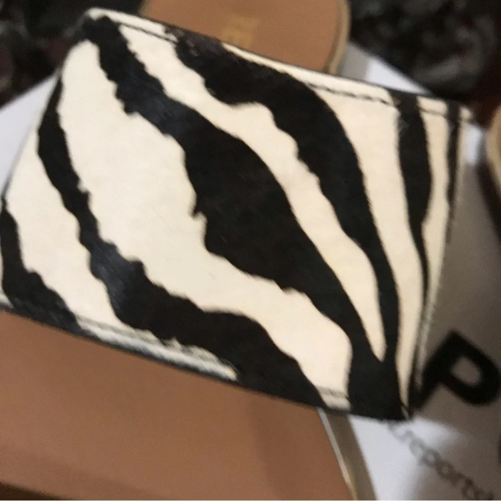 🦓REPORT Black Exotic Slip On Sandals